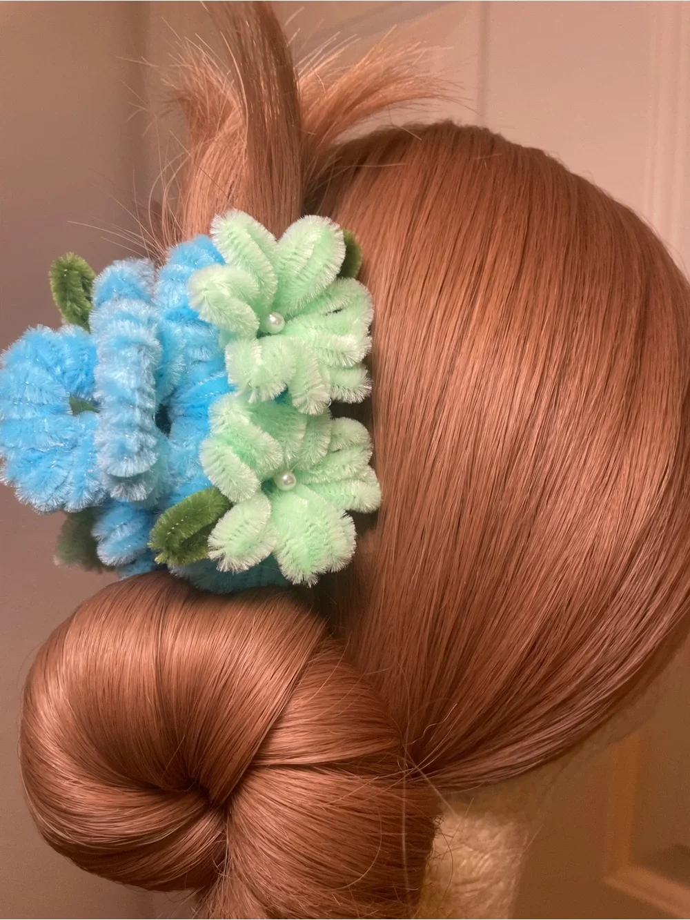 Handmade blue and green pipe cleaner floral hair clip